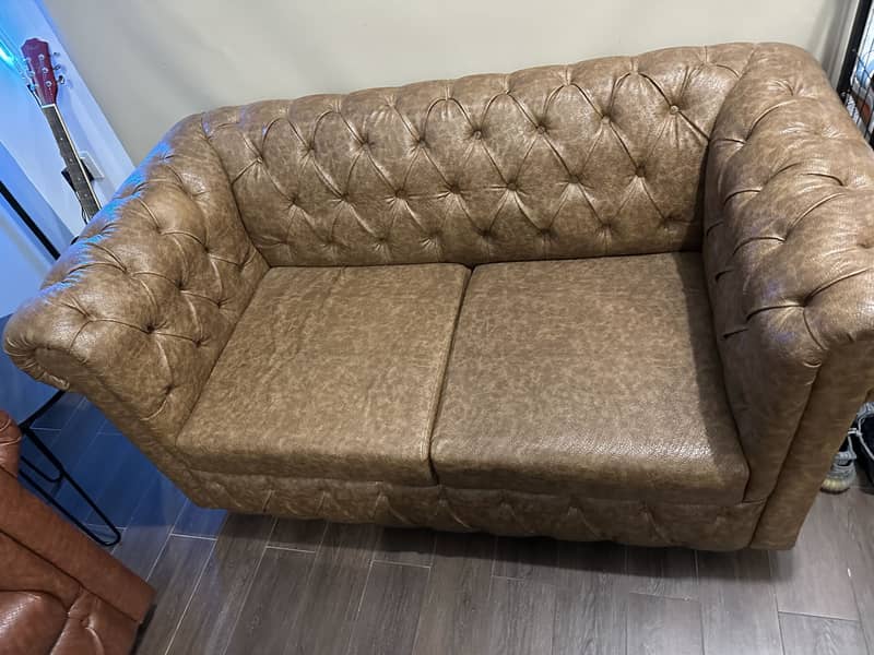 2 sofas (2 seater each) 3