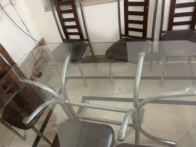 6 seater Glass Dining Table in Modern Industrial style