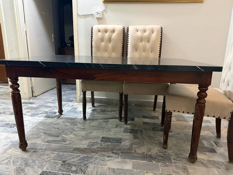 Dinning Table plus chairs 1