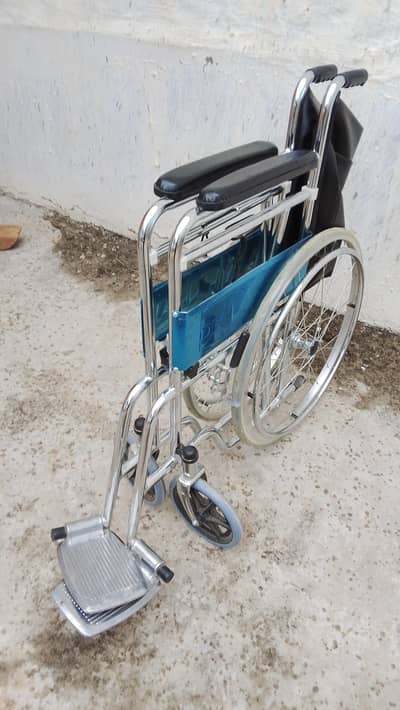 fold able wheel chair with commud toitet pure steel new
