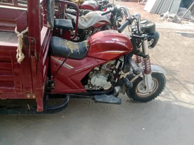 loader rickshaw   red colour
