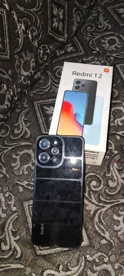 Xiaomi Redmi 12.4+4 128 with box. 03228312798
