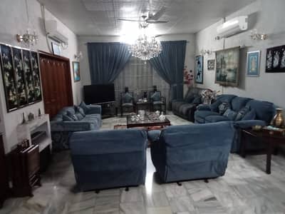 One Kanal Used Modern Design Bungalow For Sale At Prime Location Of DHA Lahore Near To Commercial Market.