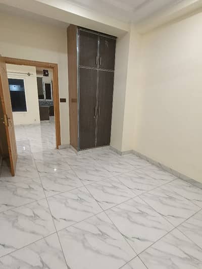 2 Bed Lounge Family Building