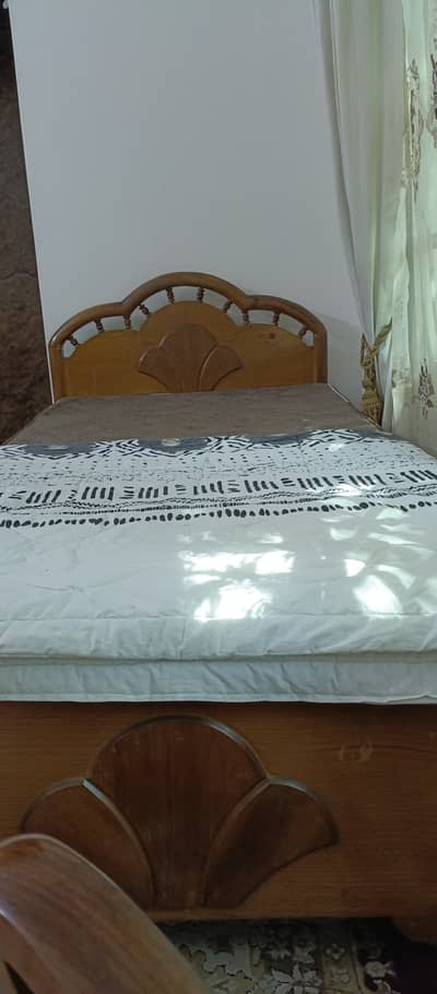 Two single beds n tv trooly