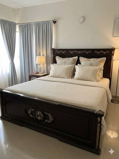 A beautiful wooden bed for sell.