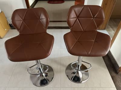 Stools (3 brown and 1 black)
