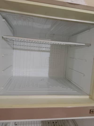 medium size looks new fridge for sale