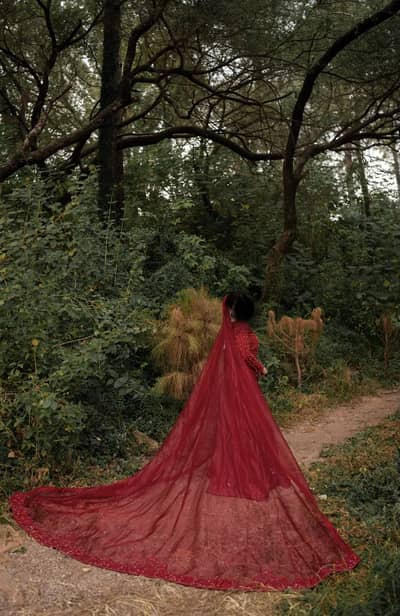 Red beautiful wedding dress with long veil