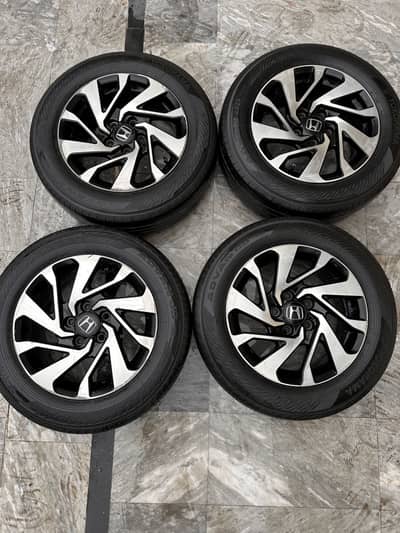 Honda Civic x OEM wheels with Yokohama tyres