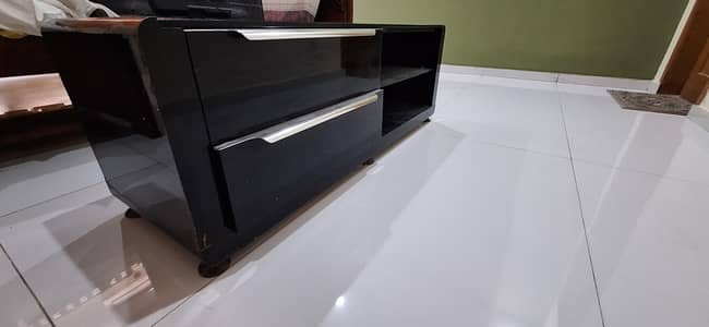 Modern TV console slightly used.