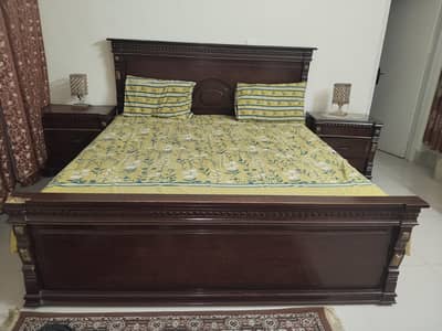 used bed with dressing and meters