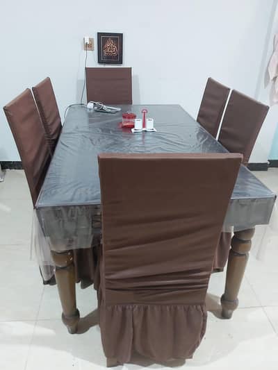 Brown wooden 6-seater dining table