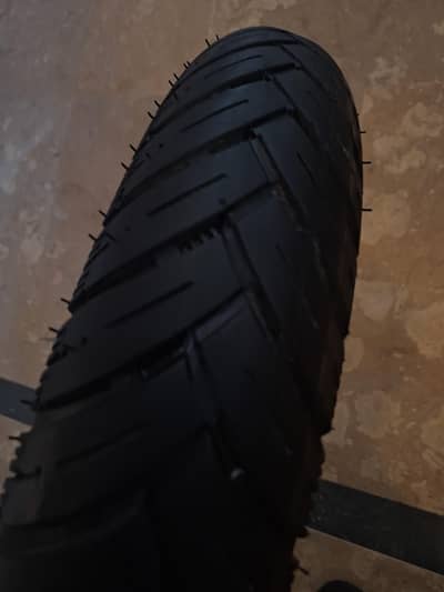 Tyre 100/90/17 with tube