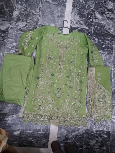 Embroidered organza stitched dress in reasonable price
