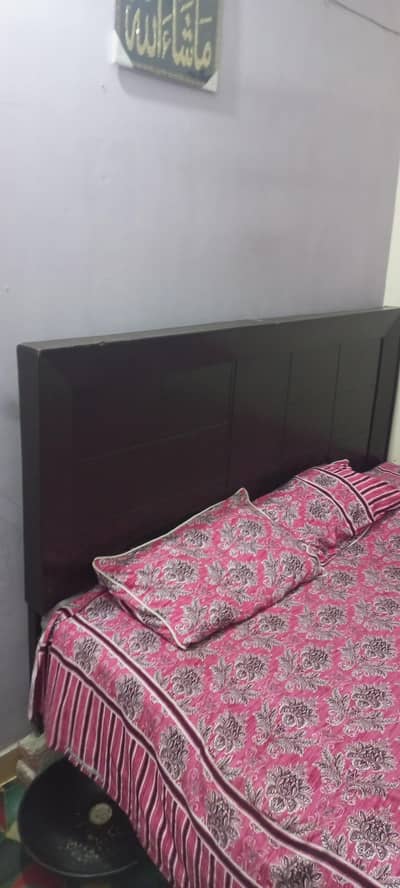 Soled bed for sale gud condition 9by10 condition