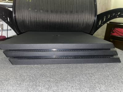 Play station 4 Pro In Mirror Condition. Not a Single Scratch On It
