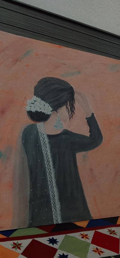 girl painting on canvas