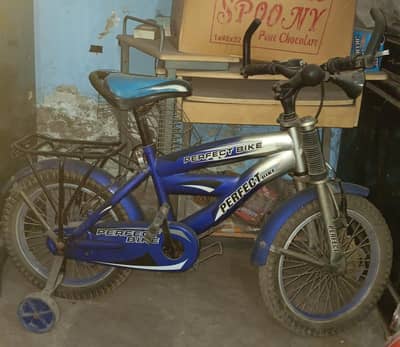 Kids bicycle in blue colored