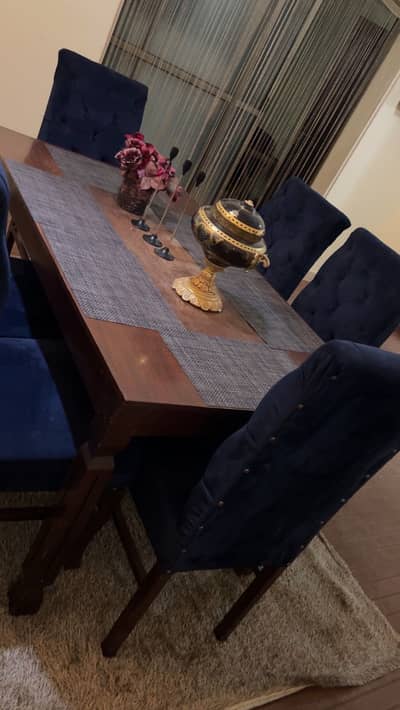 Wooden table with 6 chairs