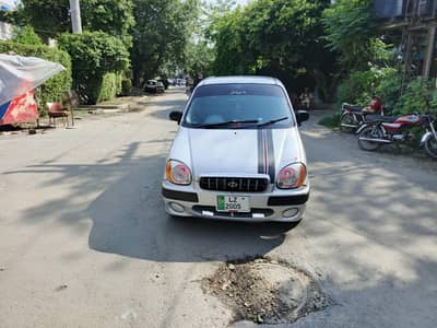 2005 Santro Executive with Original power steering/windows. alloyrims