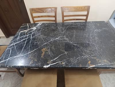 6 chair and marble top wooden dining table