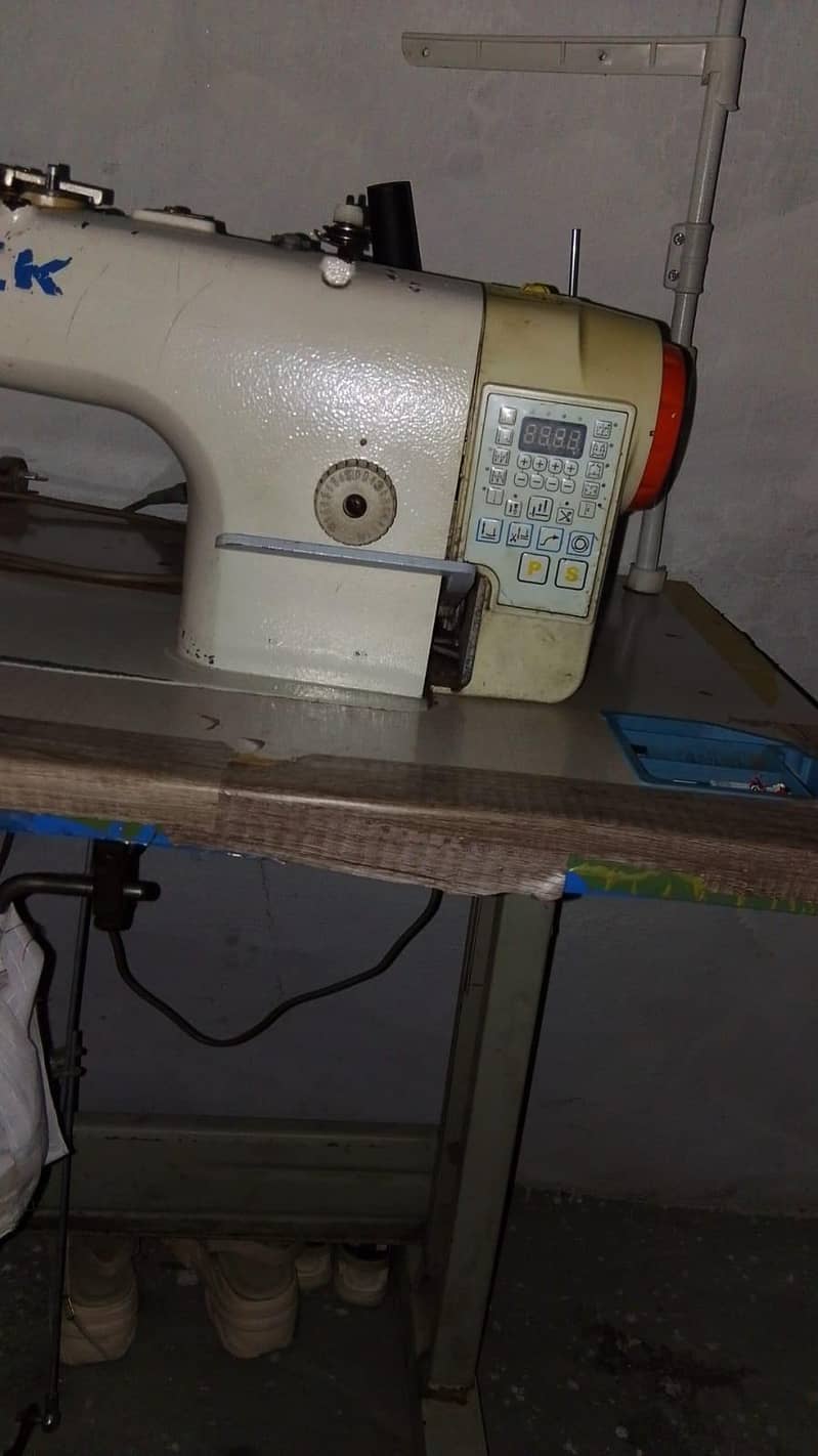 singer machine 1