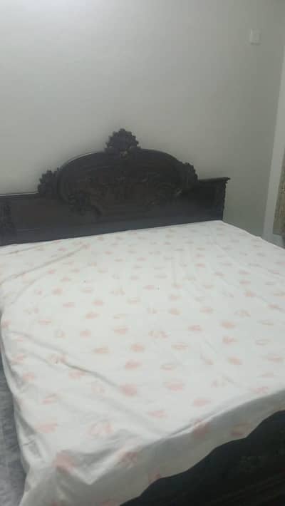 Wooden Double Bed Available For Sale.