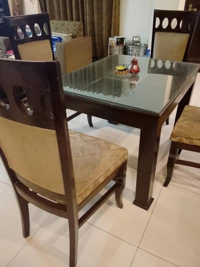 Dining Table (along with Glass top)