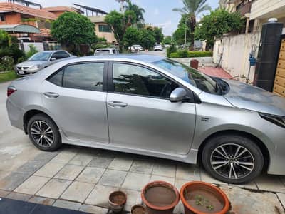 Toyota Altis 1.6 silver color Model 2019