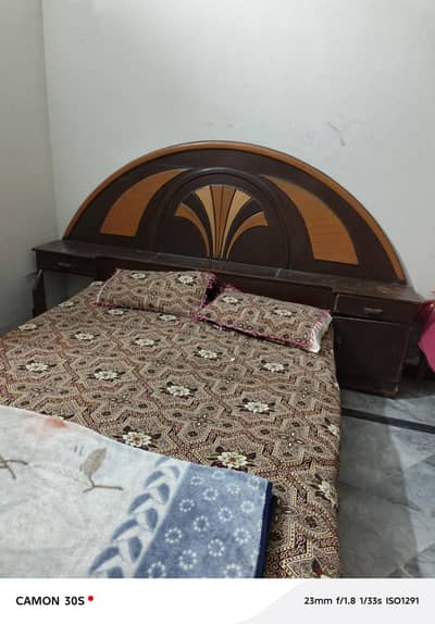 used bed and dressing