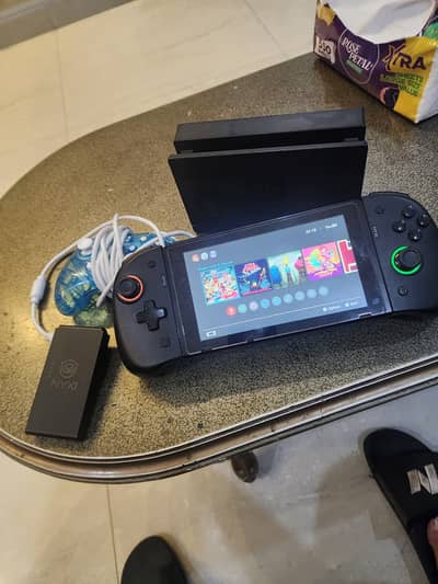 Modded Switch + dock + extra controller +tons of games