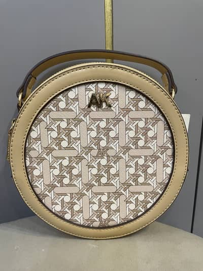 Annie klien branded bag