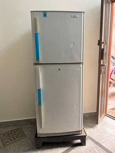 Grey double-door refrigerator