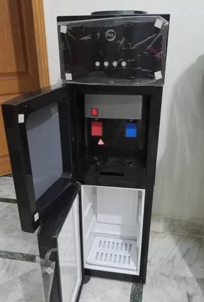 pel water dispenser like new  0301- 9823 / 095