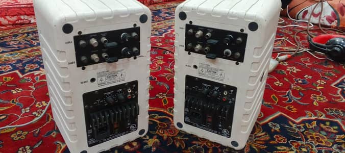 studio monitors powered speakers