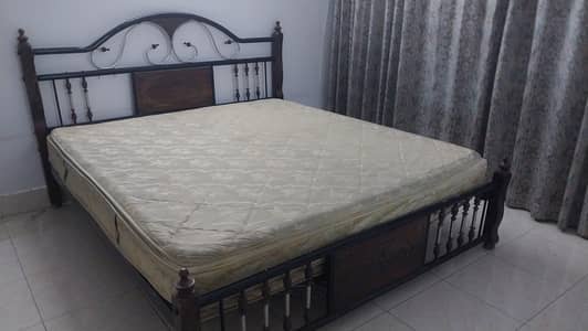 Iron bed with spring mattress