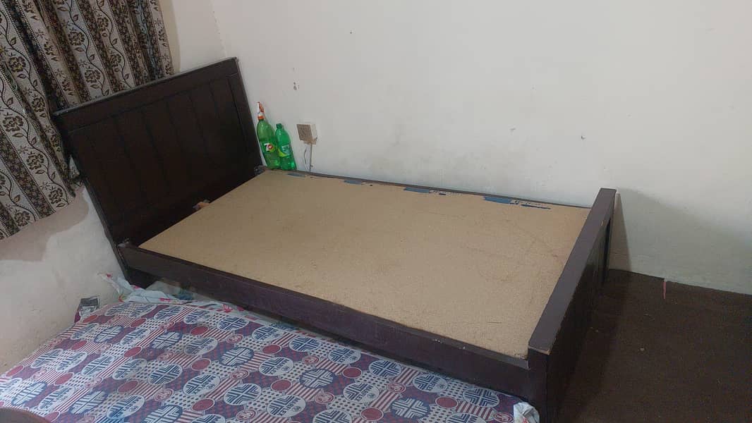SINGLE BED( ALMOST NEW)(MATTRESS NOT INCLUDED) 0