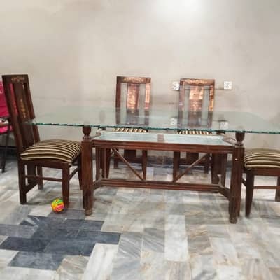 Wooden Dinning Table of double top glasses of capacity of 8 chars