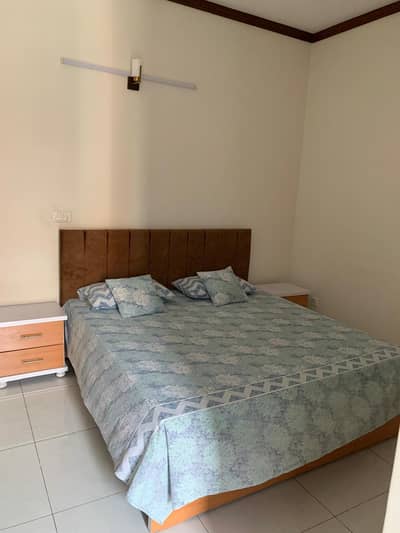 Bed with 2 sides,dressing and cupboard