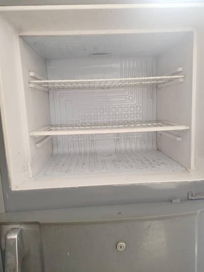 Waves double door fridge in good condition.