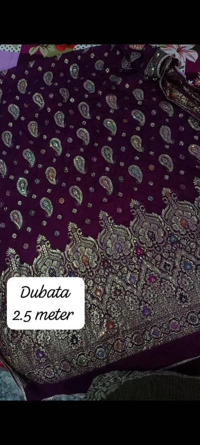 1 suite unstitched and 1 ready to wear same