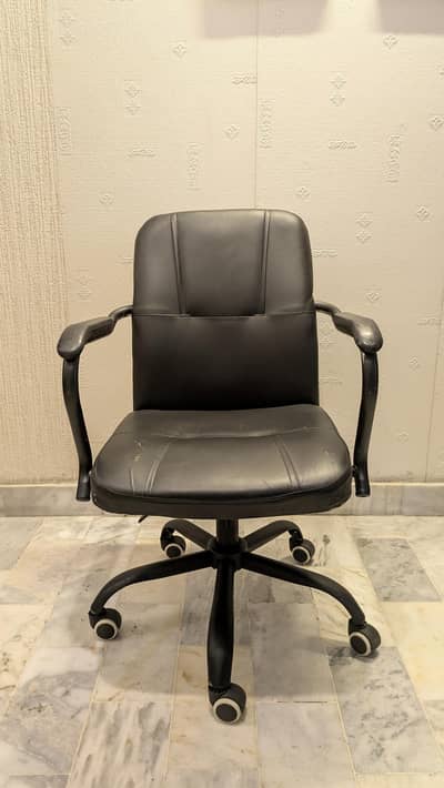 Black Revolving office computer chair