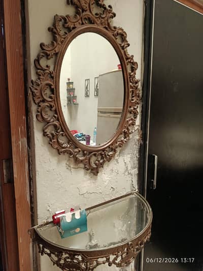Mirror and shelf