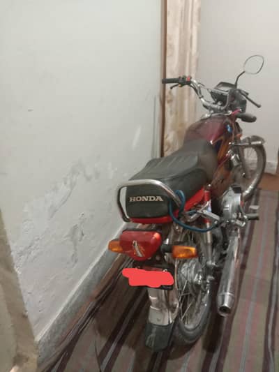 new trier in red colour and raping gust buy and drive