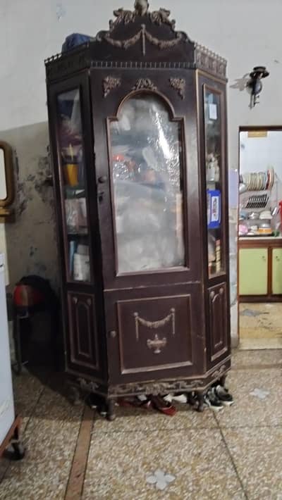 showcase for sale with glass door inside