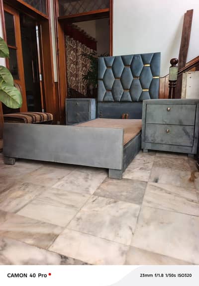 single bed with side tables