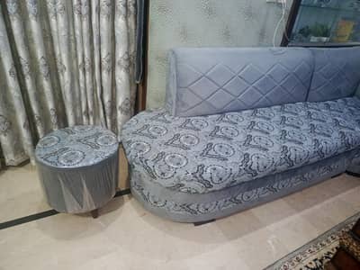 L sofa with 2 round seater stool