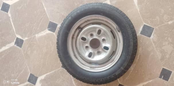 New one tyre with rim for sell.