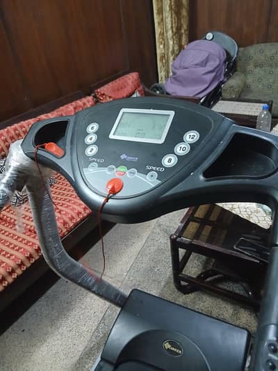 American treadmill one hand used